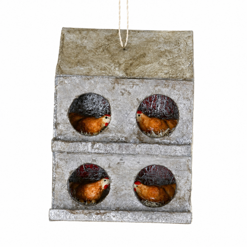 Rustic farmstead nesting boxes ornament with four hens inside round openings.
Paper mache chicken nesting box Christmas ornament with weathered farmhouse finish.
Hanging farmhouse ornament measuring 3.25 x 2.25 x 4.25 inches.