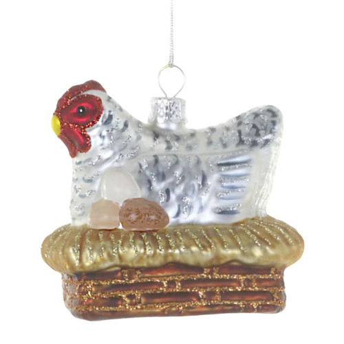 Glass Easter Egger hen ornament with eggs on a nest base.
Speckled chicken Christmas ornament with red face and glitter accents.
Farmhouse hen ornament with eggs and silver hanging cord.