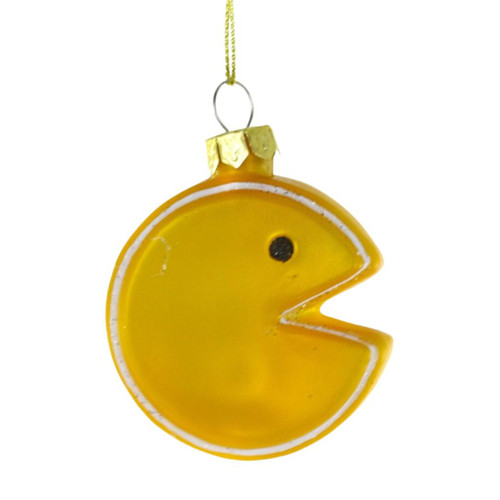 Glass retro video game man ornament with yellow round shape, open mouth, black eye, and white outline.
Arcade-inspired Christmas ornament hanging from a gold cord with glossy yellow finish.
Retro Video Game Man glass ornament measuring 2 x .75 x 2 inches.