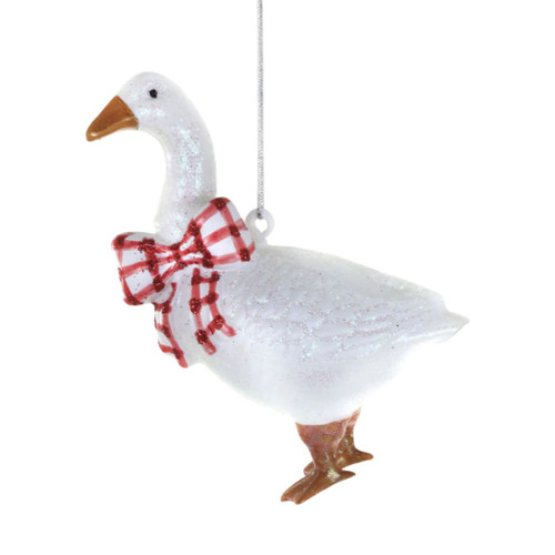Glass country cottage goose ornament with white body, orange beak and feet, and red checked bow.
Farmhouse-style goose Christmas ornament hanging from a silver cord with glitter details.
Country Cottage Goose glass ornament measuring 3.5 x 2 x 4.5 inches.