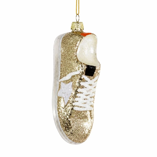 Tan glass sneaker ornament with white laces, white star accent, cream sole, and glitter finish.
Sporty tan Christmas ornament shaped like a sneaker hanging from a gold cord.
Tan Luxe Star Sneaker glass ornament measuring 1.75 x 4 inches.