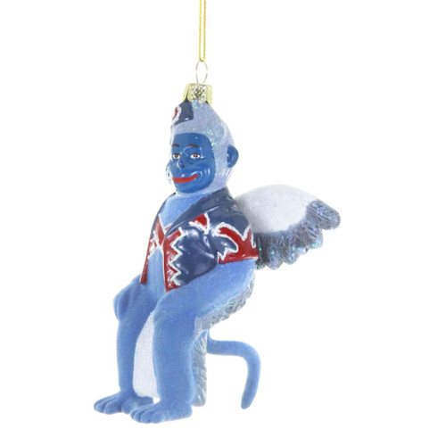Glass flying monkey ornament with blue body, white wings, curled tail, and red-and-blue jacket.
Fantasy-inspired Christmas ornament showing a winged monkey hanging from a gold cord.
Flying Monkey glass ornament measuring 4.5 x 2.25 x 5 inches.