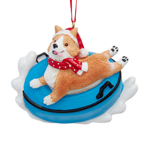 Corgi riding a colorful snow tube personalized Christmas ornament.
Bundled-up corgi dog ornament with space for a handwritten name.
Kurt Adler 3.75-inch resin corgi snow tube ornament.