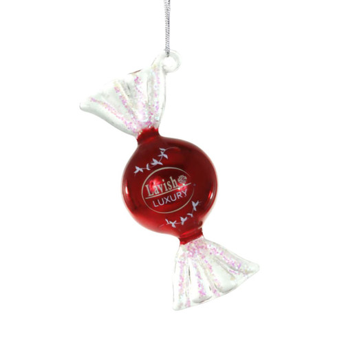 Glass truffle Christmas ornament shaped like a wrapped candy with a glossy red center.
Candy ornament with white glittered twist ends, silver hanging cord, and printed luxury-style detail.
1.25 x 1.25 x 3 inch glass truffle ornament for candy-themed Christmas décor.