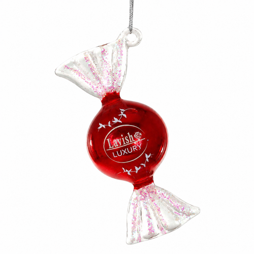 Glass truffle Christmas ornament shaped like a wrapped candy with a glossy red center.
Candy ornament with white glittered twist ends, silver hanging cord, and printed luxury-style detail.
1.25 x 1.25 x 3 inch glass truffle ornament for candy-themed Christmas décor.