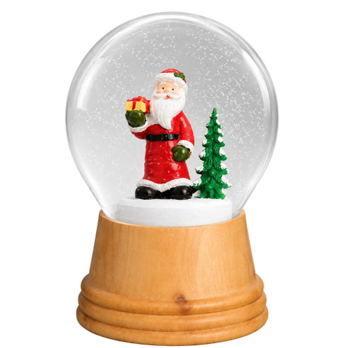 Glass snow globe with Victorian-style Santa, gift, tree, and wooden base.
Real Viennese Santa snow globe with Christmas tree inside.
5-inch Austrian snow globe with warm wooden base.