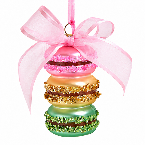 Glass macarons holiday ornament with multicolor macarons and decorative bow hanging on branch.