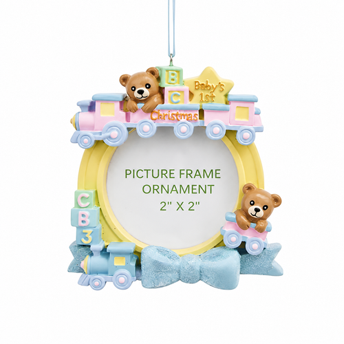 Baby’s 1st Christmas boy train picture frame ornament with teddy bears and pastel blocks.
Resin and paperboard ornament with blue bow, yellow frame, and 2" x 2" round photo opening.
3.5-inch Kurt Adler hanging keepsake frame ornament for baby’s first Christmas.
