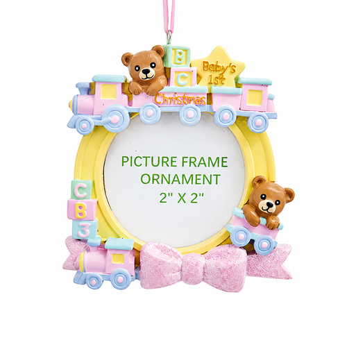 Baby’s 1st Christmas girl train picture frame ornament with teddy bears and pastel blocks.
Resin and paperboard ornament featuring a pink bow and 2" x 2" round photo opening.
3.5-inch Kurt Adler keepsake frame ornament for displaying a baby's first Christmas photo.