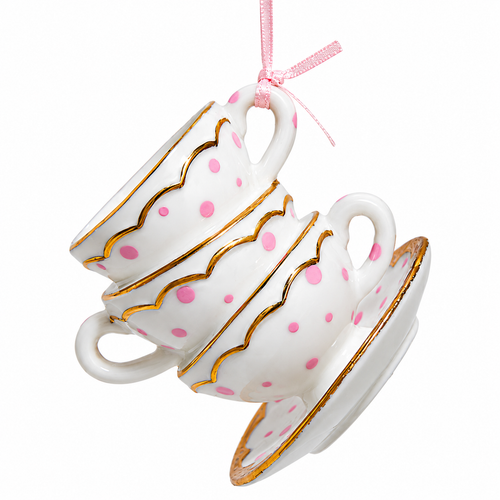 Stacked polka dot tea cup ornament with pink dots and gold trim.
Porcelain tea cup Christmas ornament with scalloped edges and pink ribbon.
3-inch Kurt Adler hanging ornament for tea lover and kitchen holiday décor.