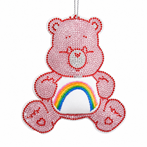 Pink bedazzled Cheer Bear ornament with sparkling gem accents and rainbow belly badge.
4-inch hanging character ornament featuring Fabmache, plastic, and polyester construction.
Care Bears-inspired holiday ornament with rhinestone-style detailing and festive sparkle.