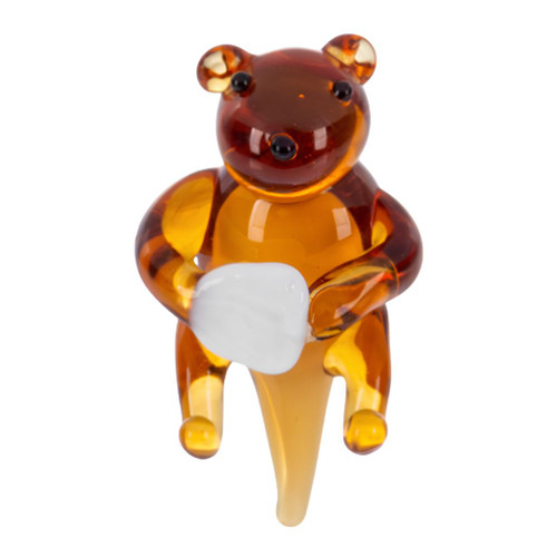 Tiny amber glass otter miniature with black eyes and rounded ears.
Small glass otter holding a white shell detail in its paws.
Miniature World glass otter for fairy gardens and tiny displays.