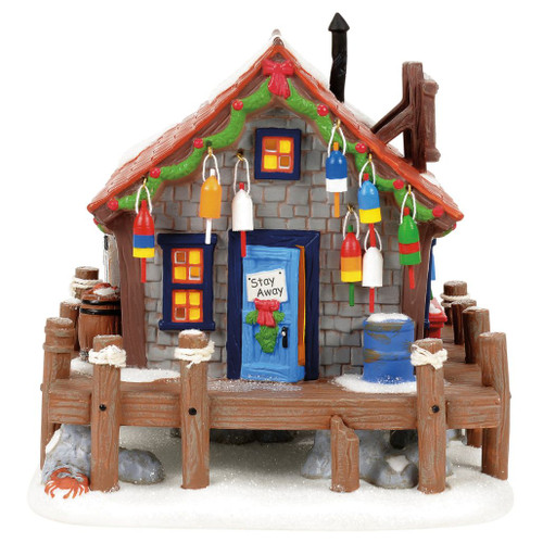 Department 56 Disney Village Pete’s Crabby Christmas lighted crab shack building with snowy dock.
Pete’s Crab Shack porcelain village building with hanging buoys, glowing windows, and USB cord.
Disney Village coastal Christmas building shown with No One's Crabby At Christmas accessory sold separately.