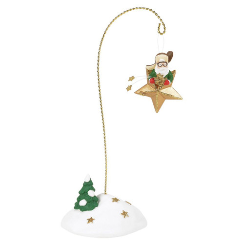 Department 56 Gathering Stardust accessory with Santa riding a gold star above a snowy base.
North Pole Village accessory with curved gold support, small evergreen tree, and glittering stars.
Porcelain, plastic, and zinc alloy Santa stardust figure measuring 9.41 inches high.