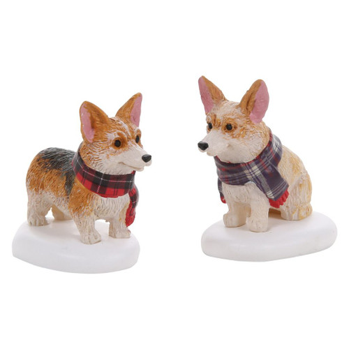Department 56 Highland Corgis set with two small corgis wearing plaid scarves.
Cross Village polyresin dog accessories on snowy white bases for holiday village displays.
Set of 2 corgi figures, each measuring 1.2 inches high, with red and blue plaid scarves.