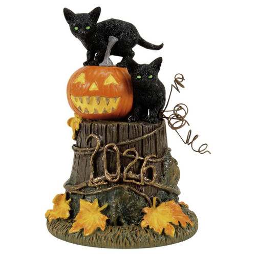 Department 56 50th Feline Noir, 2026 accessory with two black cats and a carved pumpkin.
Snow Village Halloween figure with black cats, jack-o’-lantern, tree stump, curling vines, and fall leaves.
Halloween village accessory made with metal, calcium carbonate, and resin cat-and-pumpkin details.