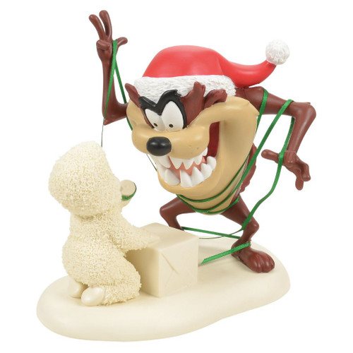 Snowbabies "Taz Needs Ribbon!" figurine featuring Taz tangled in green ribbon beside a Snowbaby and wrapped gift.
Officially licensed Looney Tunes holiday collectible with Taz wearing a Santa hat and handcrafted details.
Bisque porcelain Christmas figurine with polyresin and polyester accents on a snowy sculpted base.