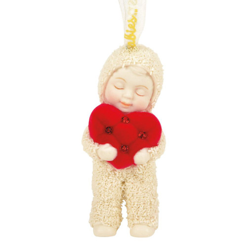 Snowbabies From the Heart ornament featuring a Snowbaby holding a red heart with ruby red gemstone accents.
Handcrafted porcelain Christmas ornament with textured bisque finish and hanging ribbon.
Snowbabies anniversary ornament with hand-painted details and rhinestone embellishments.