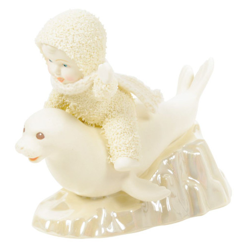 6018130 Snowbabies Slippin' Seal figurine featuring a bundled Snowbaby riding a friendly seal across an icy base.
Hand-crafted creamy bisque porcelain figurine with hand-painted details and a soft polyester scarf.
Playful winter-themed collectible figurine for seasonal and holiday displays.