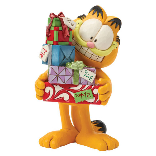Jim Shore Garfield figurine holding a tall stack of wrapped Christmas presents labeled "To: Me."
Hand-painted stone resin Garfield collectible with colorful gift boxes and folk-art quilt-inspired detailing.
Garfield smiling behind festive presents from the Heartwood Creek Collection.
