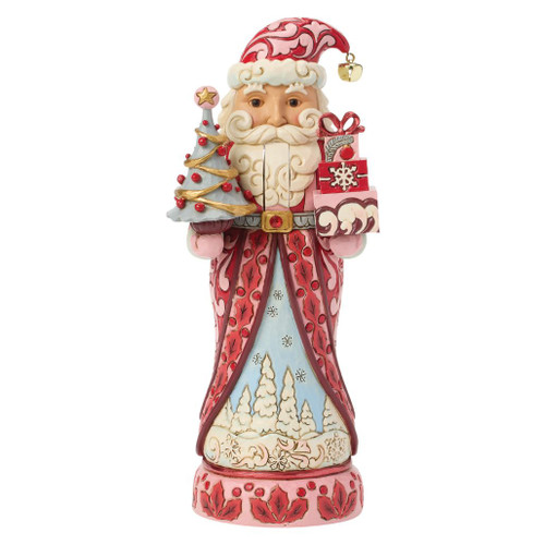 Jim Shore Heart of the Holidays Santa nutcracker in pink and crimson robes holding a decorated Christmas tree and stacked gifts.
Hand-painted stone resin Santa nutcracker with rosemaling details, movable mouth lever, and winter landscape on the front of the robe.
Decorative Heartwood Creek Santa nutcracker featuring festive pink and red colors, folk-art styling, and Christmas tree accents.