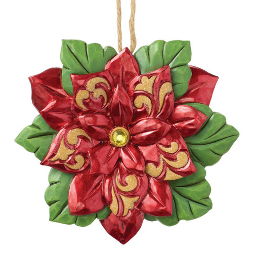 Jim Shore Legends of Poinsettia ornament featuring a vibrant red poinsettia with gold folk-art accents.
Hand-painted Heartwood Creek stone resin ornament with layered green leaves and detailed floral design.
3.35-inch hanging Christmas ornament inspired by the traditional legend of the poinsettia.
