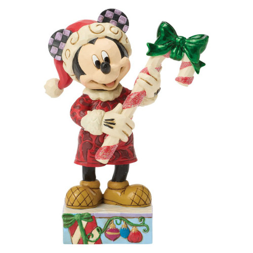 Alt 1: Jim Shore Disney Traditions Peppermint Magic figurine featuring Mickey Mouse holding a large candy cane with a green bow.

Alt 2: Hand-painted stone resin Mickey Mouse Christmas collectible wearing a Santa hat and festive red holiday coat.

Alt 3: Disney Traditions Peppermint Magic figurine with Mickey Mouse holding an oversized candy cane decorated for Christmas.