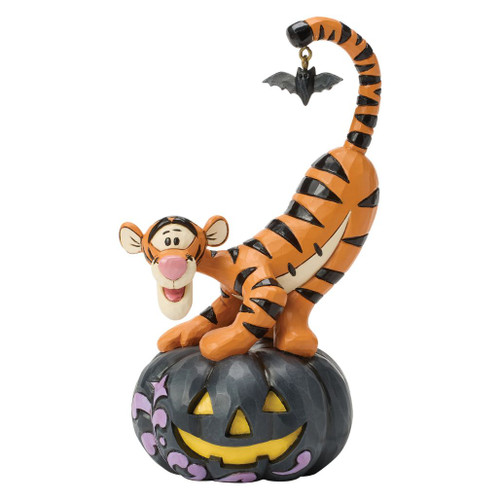 Jim Shore Tigger figurine standing on a black jack-o'-lantern with a dangling bat on his tail.
Disney Traditions Halloween Tigger collectible featuring folk-art patterns and hand-painted stone resin details.
Official Disney Tigger Halloween figurine with carved black pumpkin and playful seasonal accents.