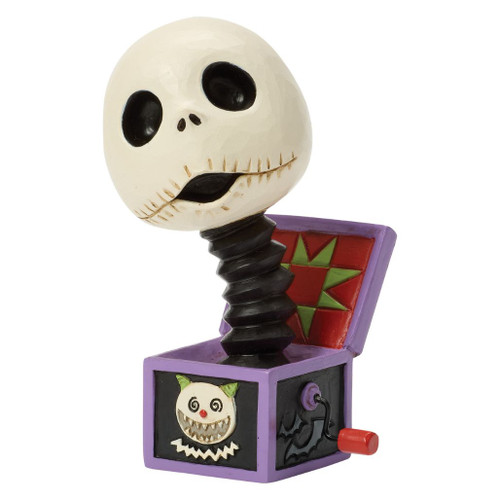 Jim Shore Disney Traditions Jack Skellington jack-in-the-box mini figurine with sculpted spring and Halloween-themed box.
Hand-painted stone resin Jack Skellington collectible featuring bats, spiderwebs, and folk art quilt-inspired details.
Multi-angle view of the Disney Traditions Jack-in-the-box mini figurine with Jack Skellington emerging from the decorative box.