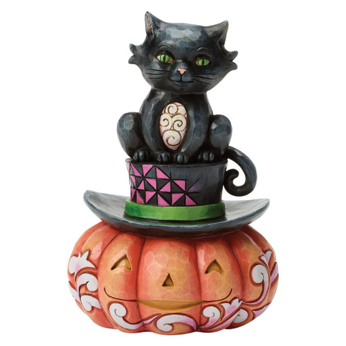 Black cat figurine sitting on a jack-o'-lantern's top hat with carved pumpkin base and folk art rosemaling accents.
Hand-painted Jim Shore Heartwood Creek Halloween collectible crafted from stone resin.
Decorative Halloween figurine featuring green-eyed black cat and whimsical pumpkin design.