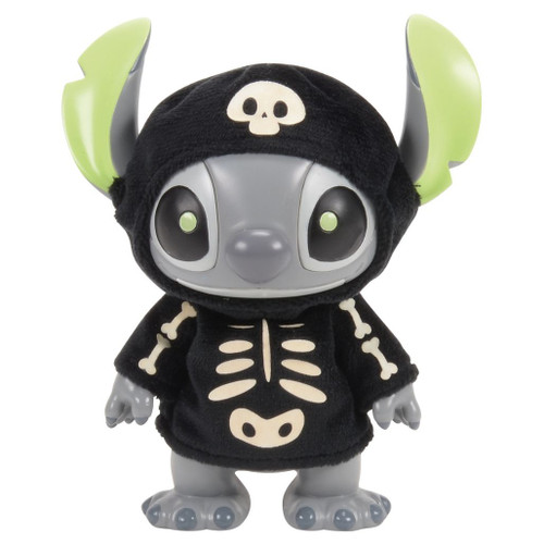 Grand Jester Studios Trick or Treat Stitch Skeleton figurine wearing a black plush skeleton costume with glow-in-the-dark bone details.
Disney Stitch Halloween collectible featuring a flocked skeleton outfit, gray vinyl body, and glow-in-the-dark accents.
Official Disney Stitch figurine with glow-in-the-dark skeleton costume, PVC and polyester construction, approximately 4.5 inches tall.