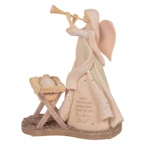Foundations angel figurine blowing a trumpet beside Baby Jesus in a manger.
Stone resin Christmas figurine with crystal accents and inspirational nativity design.
Elegant religious Christmas display featuring the message "Glory to the Newborn King."