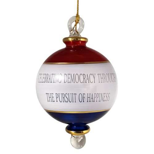 Handmade Egyptian Museum mouth-blown glass ornament with Liberty Bell etching and patriotic red, white, and blue design.
Glass Christmas ornament engraved with "America's 250th 1776–2026" and "Celebrating Democracy Through The Pursuit Of Happiness."
Handcrafted 5.5-inch patriotic ornament with etched Liberty Bell imagery and 24kt gold accents.