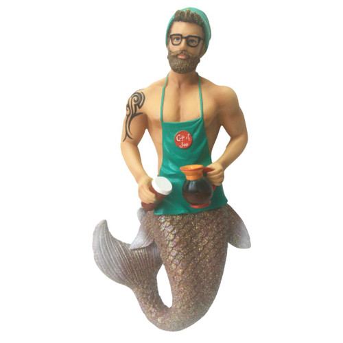 December Diamonds Java Joe Merman resin ornament featuring a coffee barista with a green apron and knit beanie.
6.5-inch collectible merman ornament holding a coffee pot and takeaway coffee cup with a glittering tail.
Whimsical coffee-themed Christmas ornament crafted from resin with detailed café-inspired styling.
