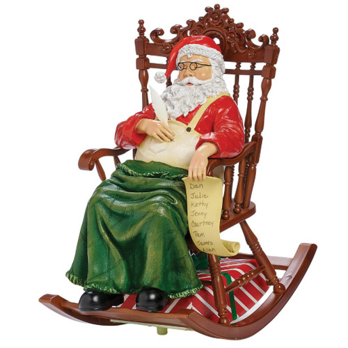 Musical resin Santa figurine seated in an ornate brown rocking chair while holding a quill and Christmas list.

12-inch Santa in rocking chair decoration with green blanket, red suit, glasses, Christmas list, and striped presents.

Musical Santa Christmas decoration in a wooden-look rocking chair with wrapped gifts tucked beneath the seat.