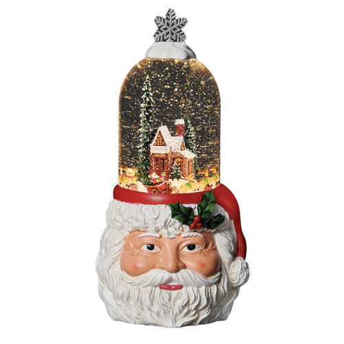 12-inch lighted Santa decoration with a winter cottage scene inside Santa’s hat.

Resin Santa base with illuminated swirling snow scene, evergreen trees, cottage, and snowflake topper.

Lighted Santa tabletop decoration measuring 12"H x 5.5"W x 5"L with USB or battery power.
