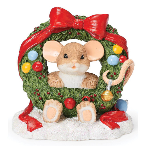 Charming Tails mouse sitting inside a green Christmas wreath topped with a large red bow.

2.5-inch resin mouse figure with colorful ornaments, red berries, and ribbon on a Christmas wreath.

Charming Tails Mouse in Wreath figure with snowy-look base, curled mouse tail, and miniature ladybug detail.