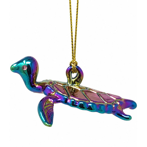 Handmade chromatic sea turtle glass ornament with an iridescent rainbow finish.
Mouth-blown glass sea turtle ornament featuring vibrant purple, blue, gold, and green reflective colors.
2.5-inch Egyptian Museum artisan glass sea turtle Christmas ornament handcrafted in Egypt.