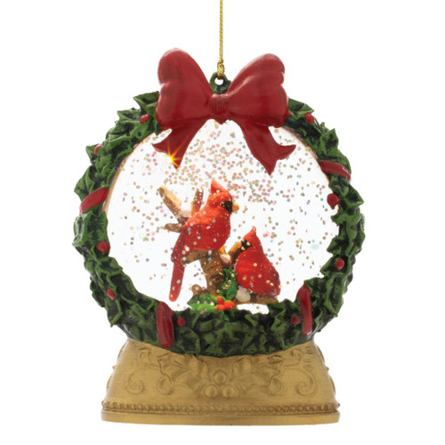 5-inch LED cardinal globe ornament with two red cardinals inside a green Christmas wreath.

Lighted cardinal ornament with red bow, holly-style greenery, clear globe, and decorative gold-tone base.

Battery-operated cardinal globe Christmas ornament with two birds and sparkling interior details.