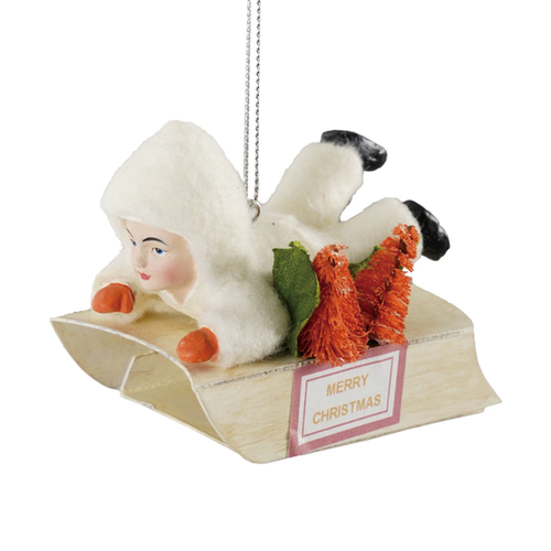 Vintage Child on Sled Ornament with Bottle Brush Trees
