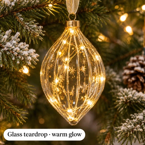 Warm LED Transparent Teardrop Ornament - warm LED lights on a decorated Christmas tree with a close-up of the bulbs