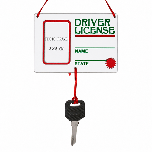 Driver's License photo frame Christmas ornament with attached miniature car key.
5-inch personalized ornament designed to hold a 3 × 5 cm photo.
Novelty keepsake ornament for celebrating a new driver's license or graduation.