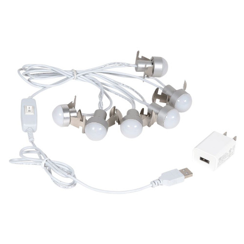 Department 56 Village USB LED 6 Light Set with six warm white LED bulbs.
USB-powered village lighting kit with inline switch and included AC adapter.
Hand-assembled six-light accessory for illuminating compatible Department 56 village buildings.