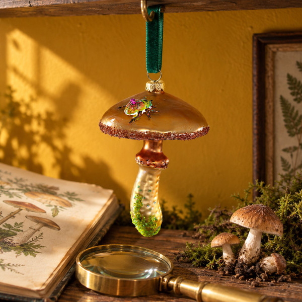 Cody Foster Bejeweled Beetle on Wooded Glen Mushroom Glass Ornament – glass Christmas ornament styled in a fun, eclectic home scene