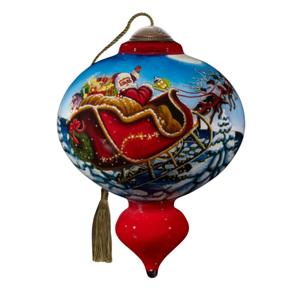 Ne’Qwa Art Santa in Sleigh Flying Over Trees Glass Ornament – 5.5 Inch