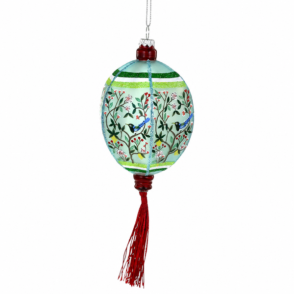 Blue glass chinoiserie lantern ornament with branches, birds, and red tassel.
Hanging lantern ornament with pale blue finish and green striped accents.
7 inch glass Chinoiserie Lantern Blue ornament on a white background.