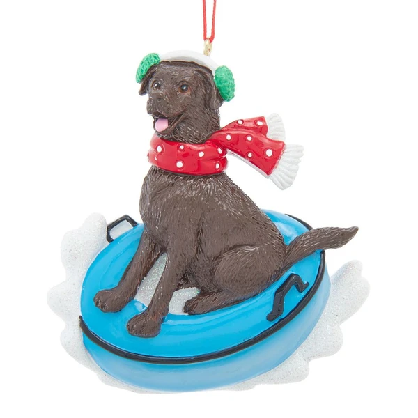 Chocolate Labrador riding a festive snow tube ornament for personalization.
Kurt Adler chocolate Lab Christmas ornament with colorful painted winter details.
3.75-inch resin dog ornament with hand-written name personalization.