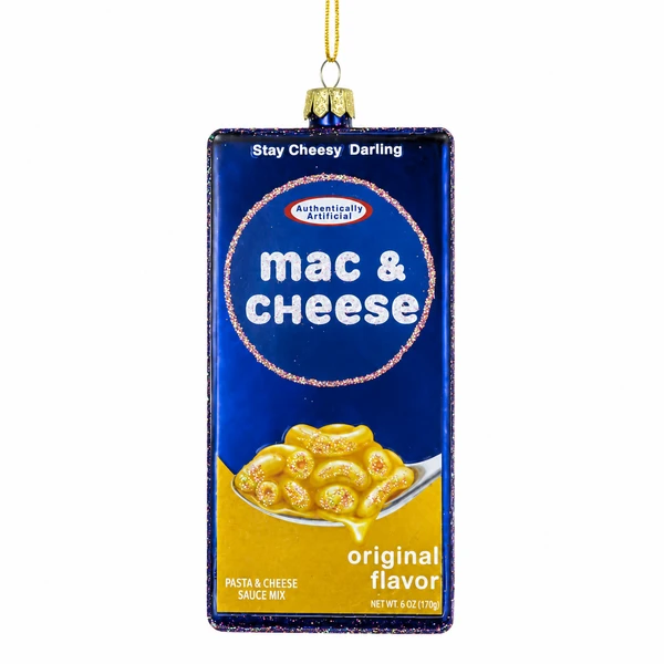 Mac & Cheese glass ornament shaped like a blue pasta box package.
Food-themed hanging ornament with spoonful of cheesy noodles graphic.
Glass mac and cheese ornament measuring 2.25 x .75 x 4.5 inches.