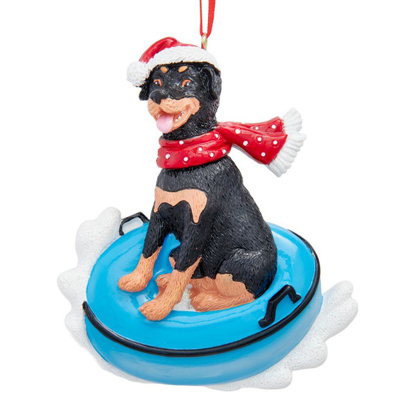 Kurt Adler Rottweiler ornament sitting on a blue snow tube with Santa hat and red scarf.
Personalized dog Christmas ornament with black-and-tan Rottweiler and snowy accents.
3.75-inch resin Rottweiler snow tube ornament with painted mica details.