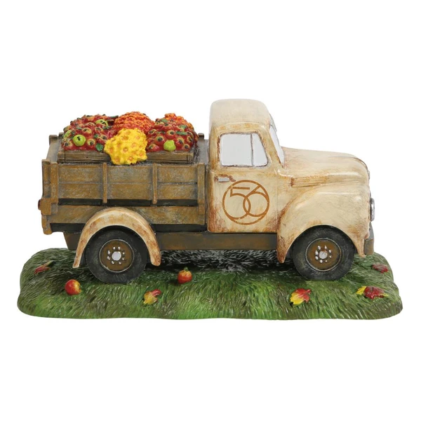 Vintage Department 56 village pickup truck loaded with red apples.
Polyresin fall village accessory with rustic farmhouse styling.
The Old Apple Truck figurine measuring 3.4 inches high by 6.6 inches long.